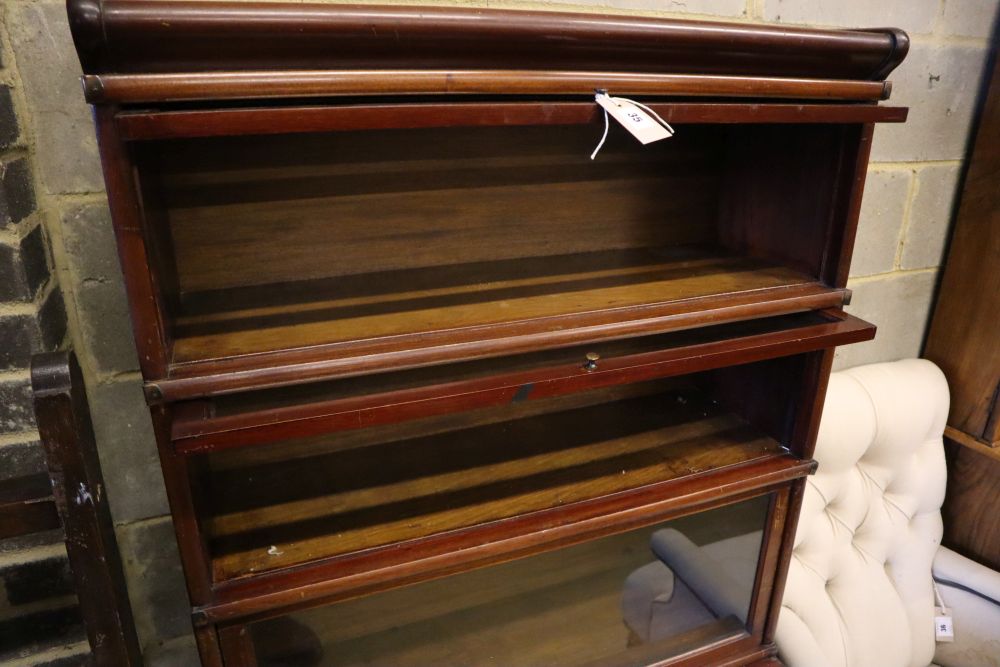 A Globe Wernicke style mahogany four tier bookcase, width 86cm, depth 30cm, height 157cm